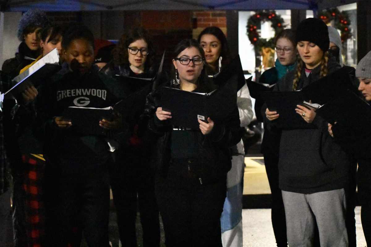 Choir sings carols at holiday market