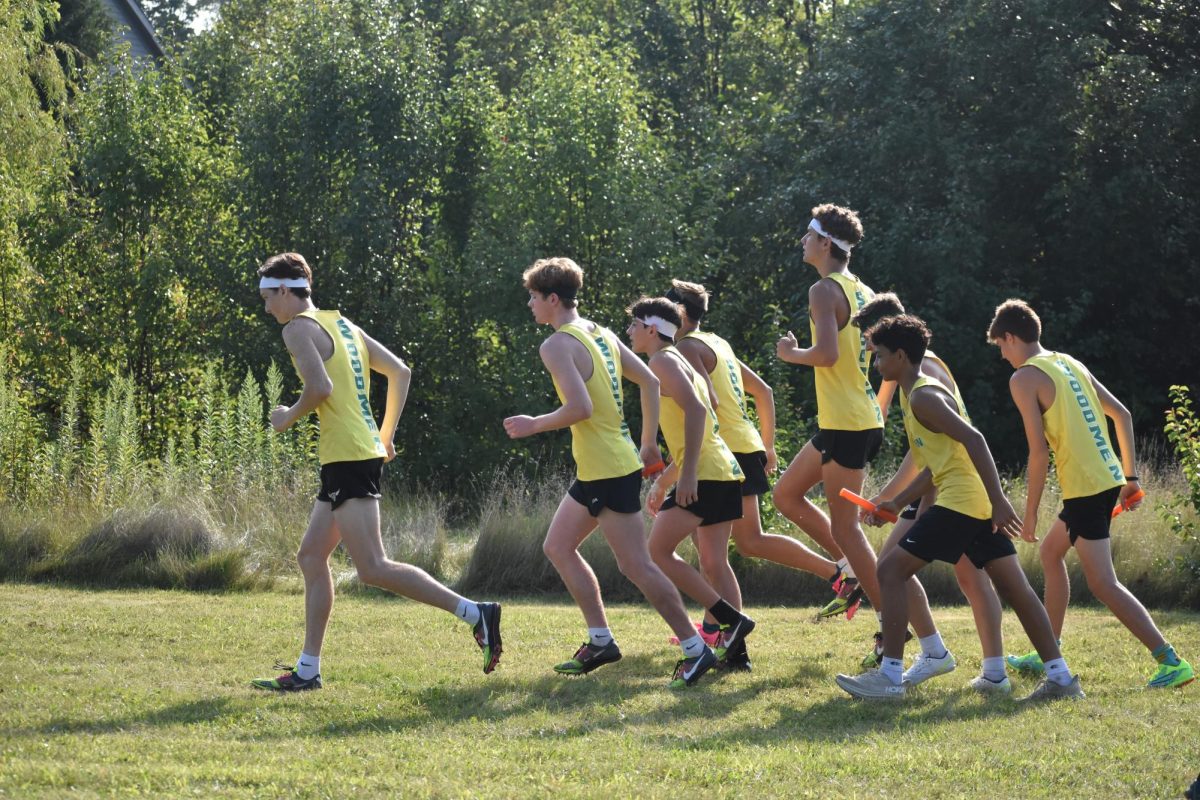 The boys cross country team prepares to start the Pike Hokum Karem. The boys placed 3rd as a team.